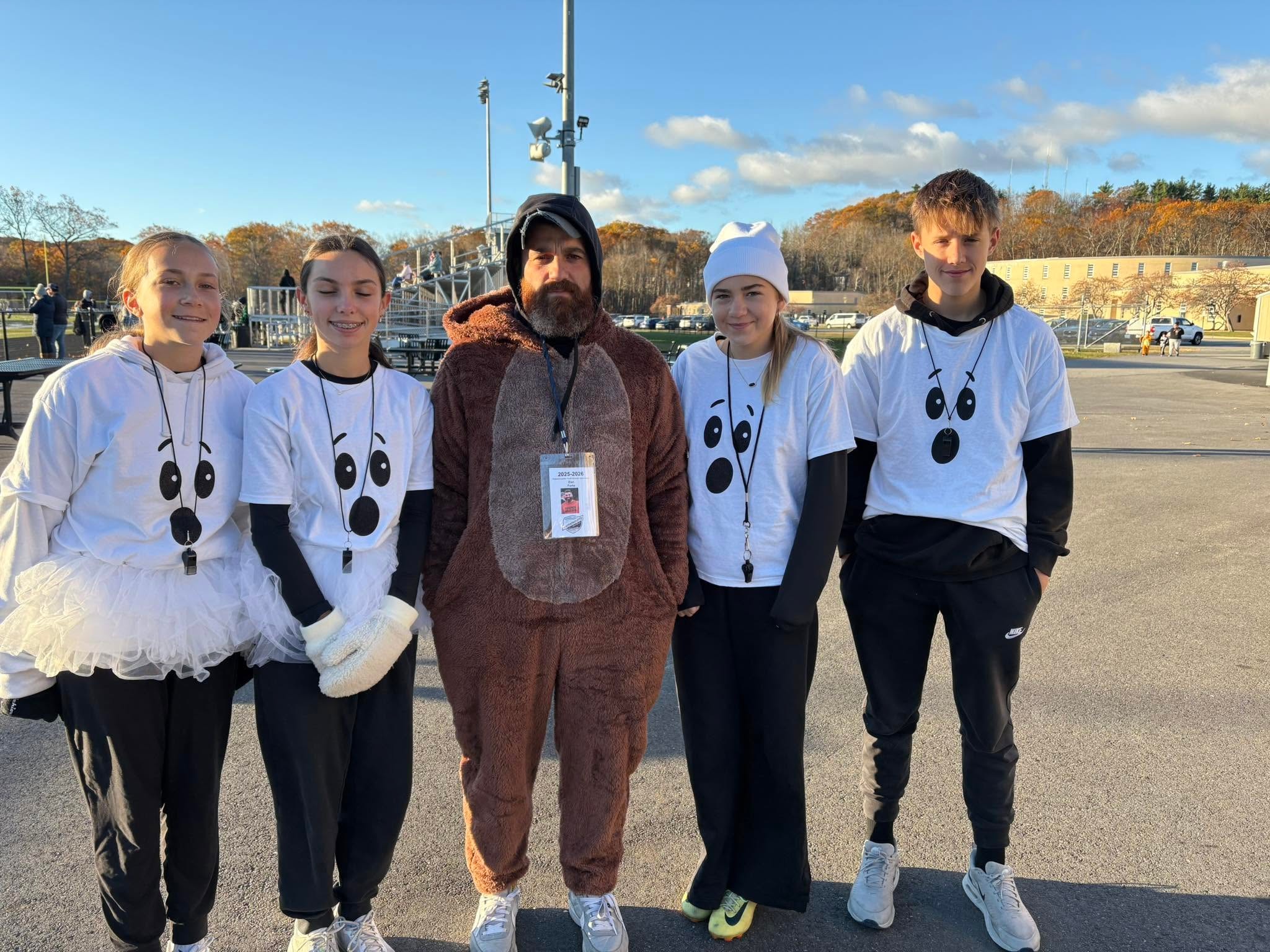 Coaches in costume at outdoor soccer event