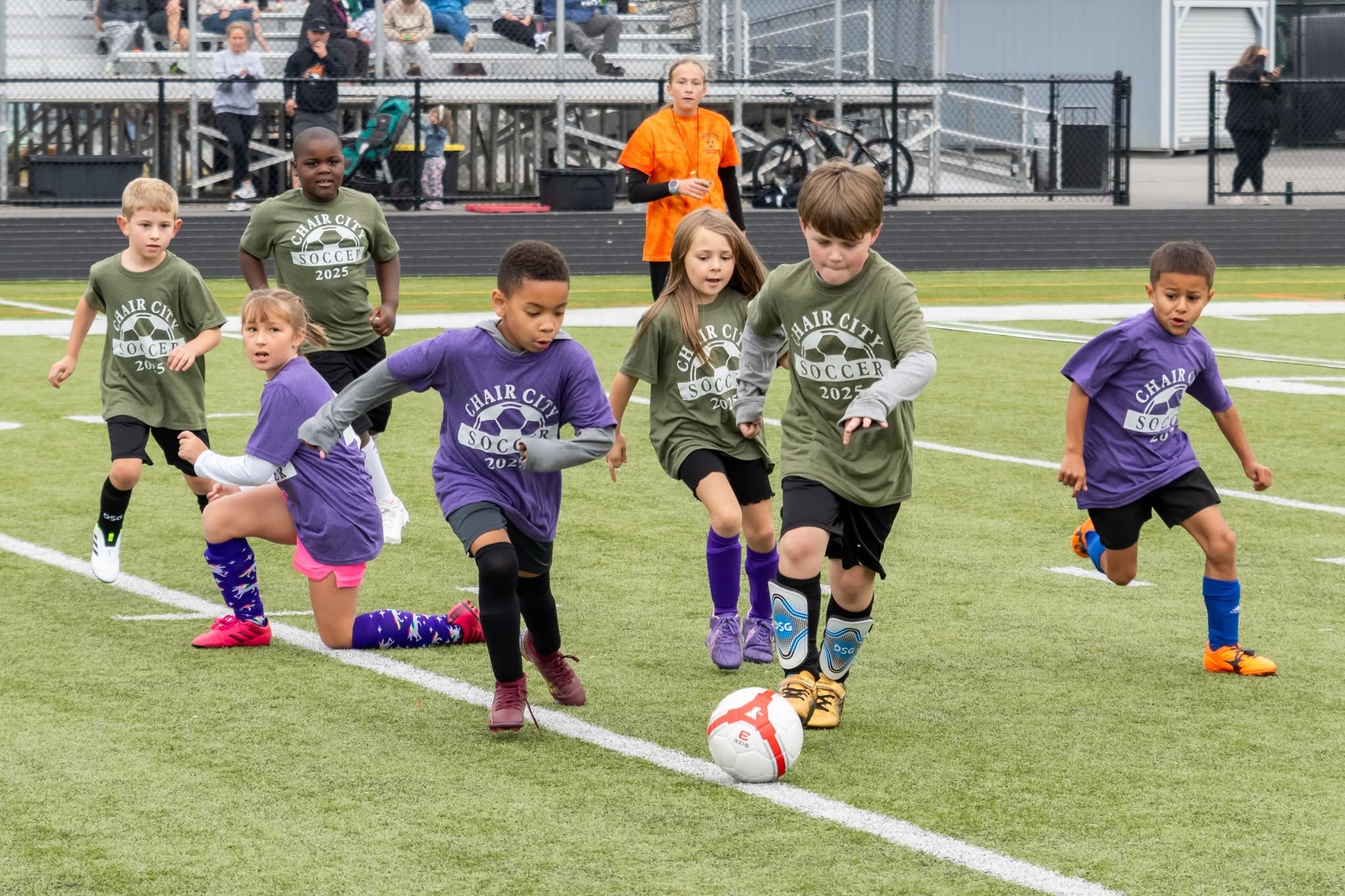 Children playing youth soccer match